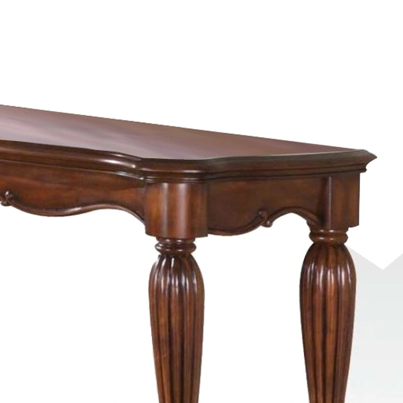 Table basse en bois sculpté, brun cerise