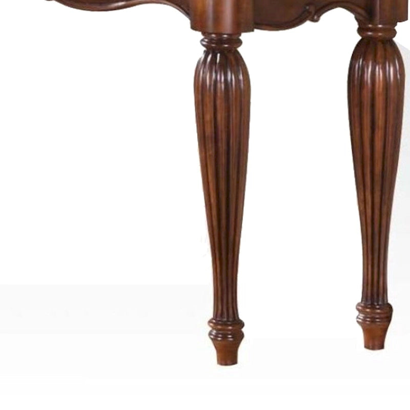 Table basse en bois sculpté, brun cerise