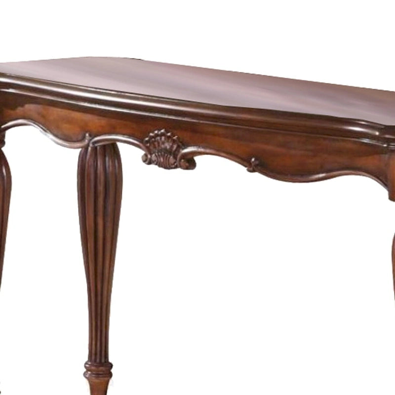 Table basse en bois sculpté, brun cerise
